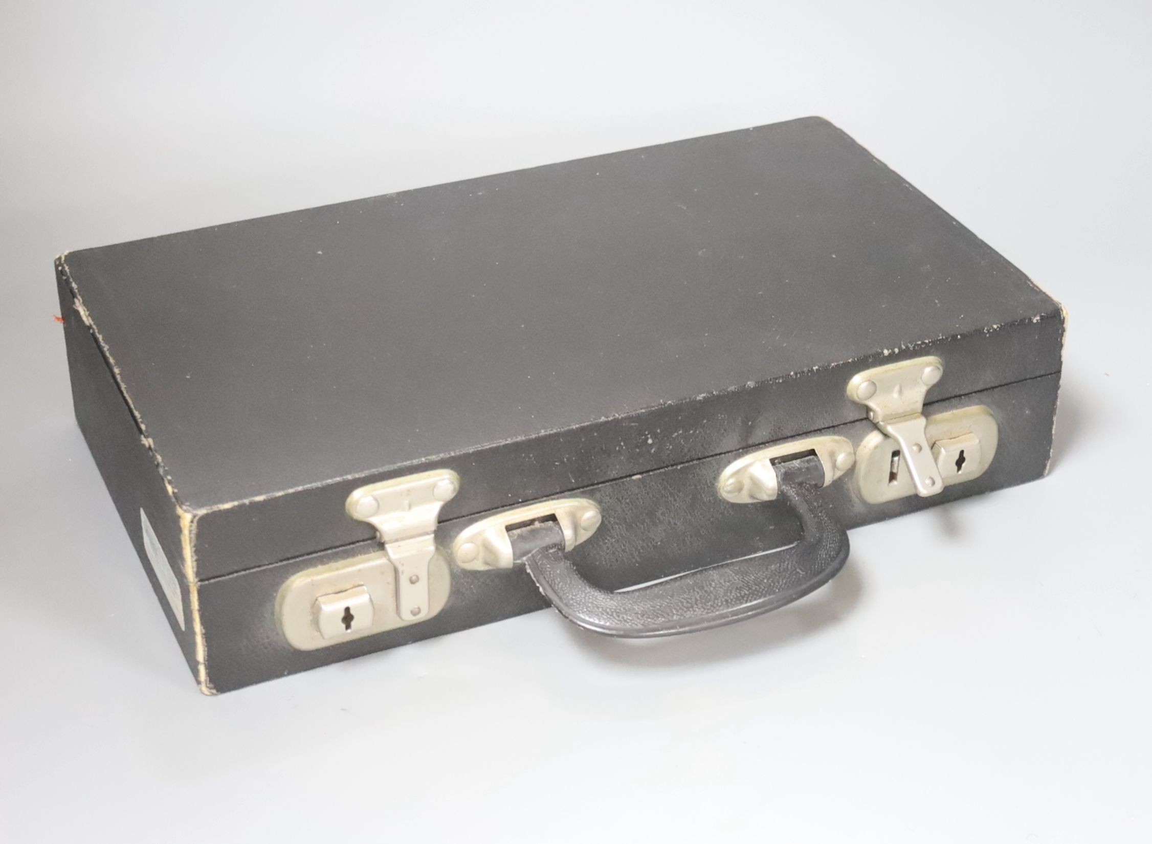 A Ward & Winterbourne ebony oboe in fitted case.